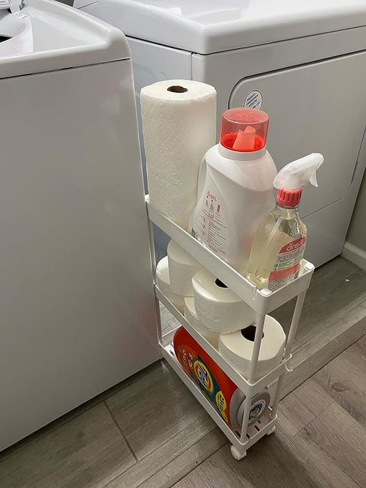 A reviewer's image of the cart pulled out from its spot between appliances, highlighting its mobility and convenience.
