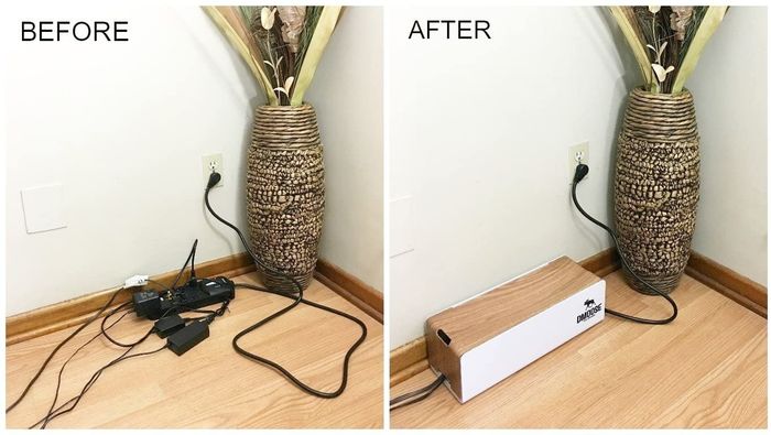 A before-and-after comparison: on the left, a messy pile of black cords on the floor, and on the right, those same cords neatly hidden inside a light brown wooden box with white sides.