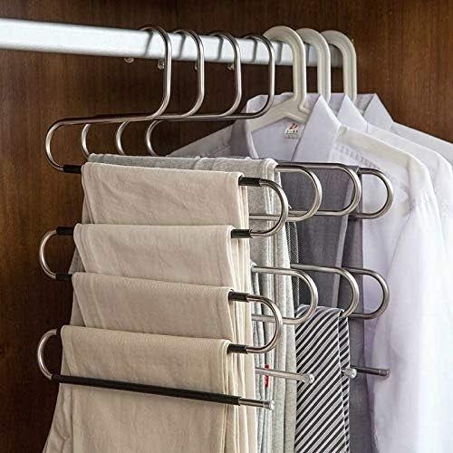 Pants and ties hanging on an S-type hanger in a closet