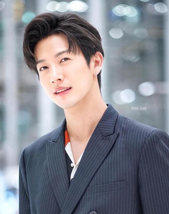 Scarves gracefully draped over the leaning ladder.