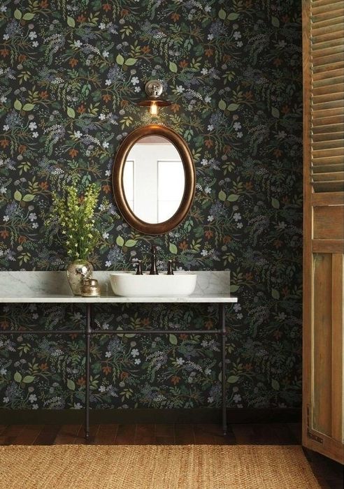 The wallpaper applied in a bathroom setting