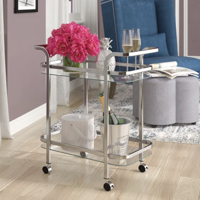 The sleek silver bar cart