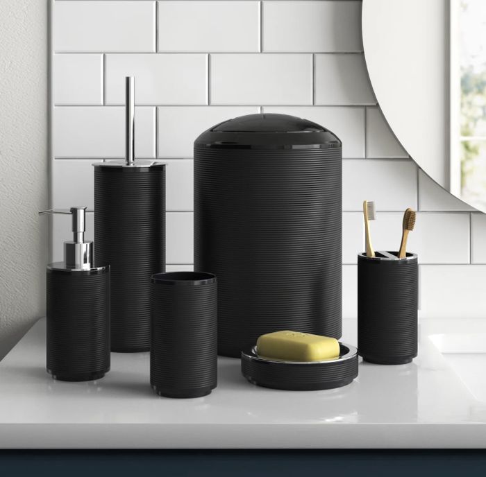 A six-piece bathroom accessory set in black