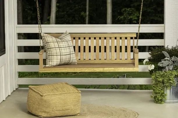 The porch swing, perfect for those peaceful moments of relaxation with a loved one.