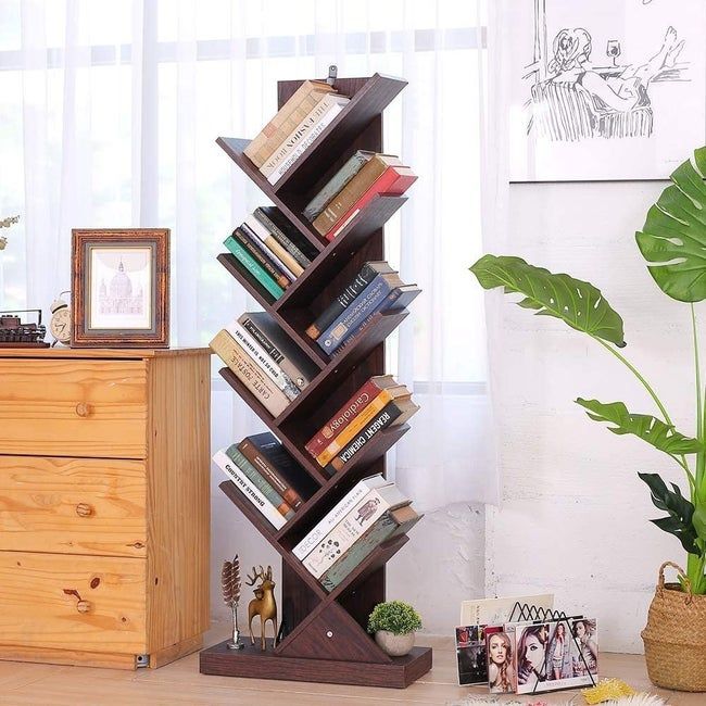 a walnut-finished shelf featuring slanted compartments