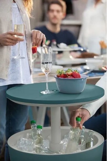 A close-up view of the blue cooler, a must-have for any gathering to keep drinks perfectly chilled.