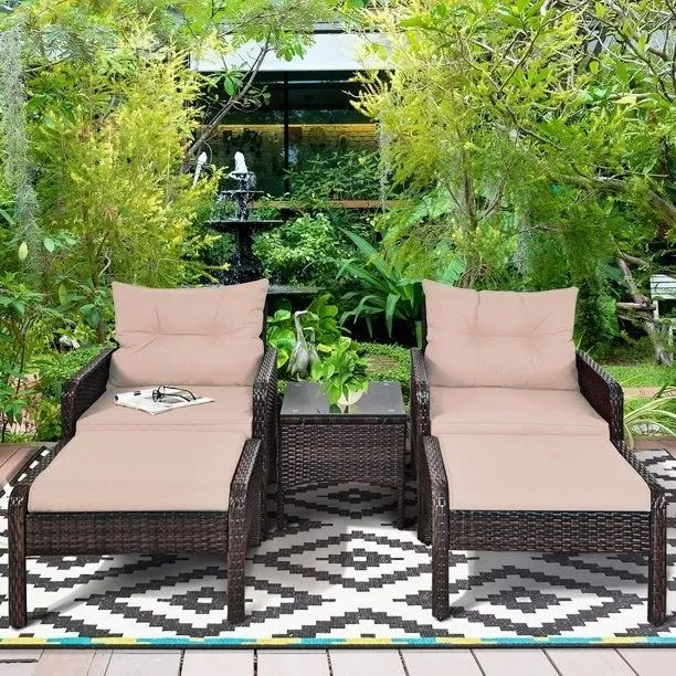 The chairs and ottomans arranged together