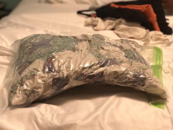 The same bag after being vacuum-sealed, now compact and space-efficient