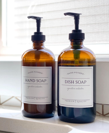 Two amber bottles on a reviewer's kitchen sink, each labeled with its contents.