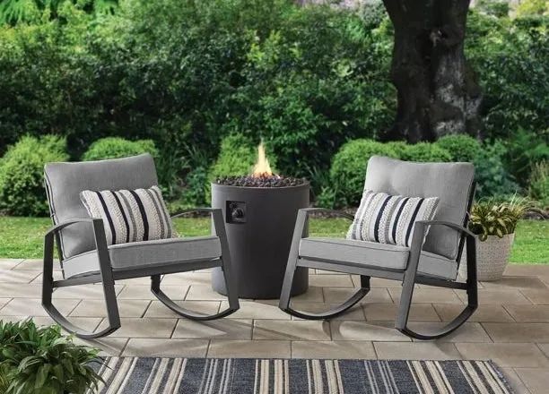 The gray steel rocking chairs, perfect for relaxing in style after a long day.