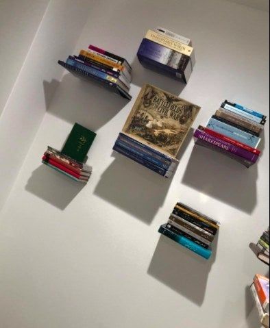 A reviewer's collection of five floating bookshelves