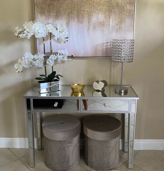 The desk repurposed as an entryway console in another reviewer's home.