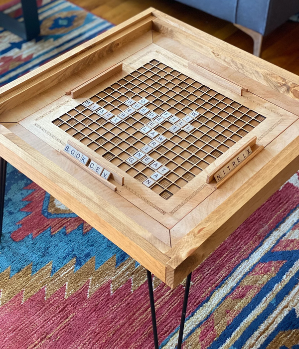 The Scrabble coffee table with the top removed.