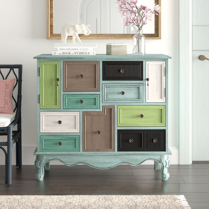 the colorful cabinet featuring drawers in four different hues