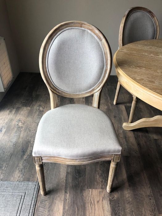a reviewer's beige chair
