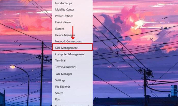 Nhấn tổ hợp phím Windows + X và chọn Disk Management từ menu.