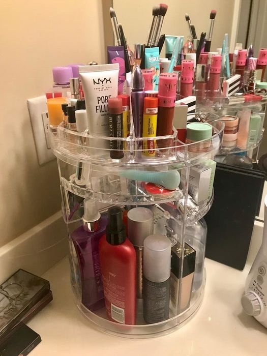A reviewer’s countertop organizer filled with various personal care items, neatly placed in the corner.