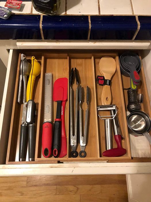 the reviewer's kitchen drawer now neatly arranged with bamboo dividers