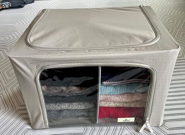 A reviewer’s cube storage unit with a zipper on top and sides, showcasing its practical design.