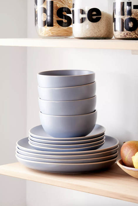 the blue dining set neatly stacked
