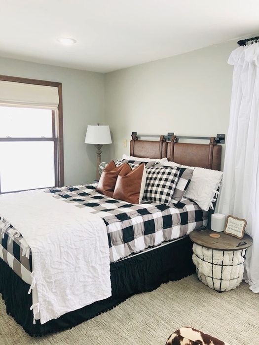 a side view of a reviewer’s brown headboard mounted on the wall