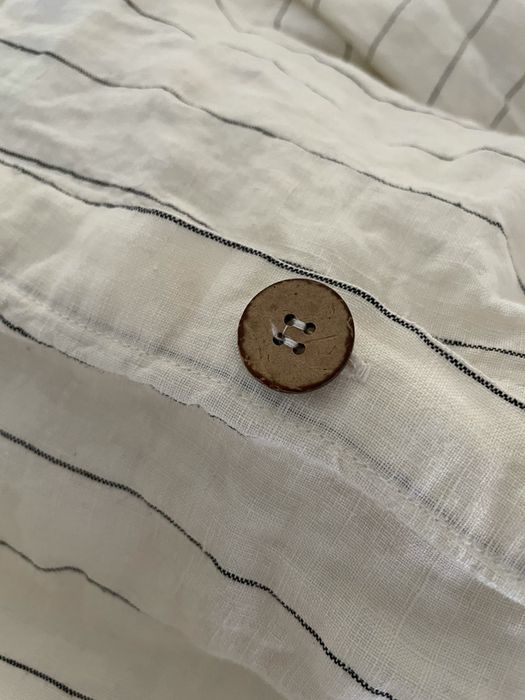 the button closure on a Mytour editor's duvet