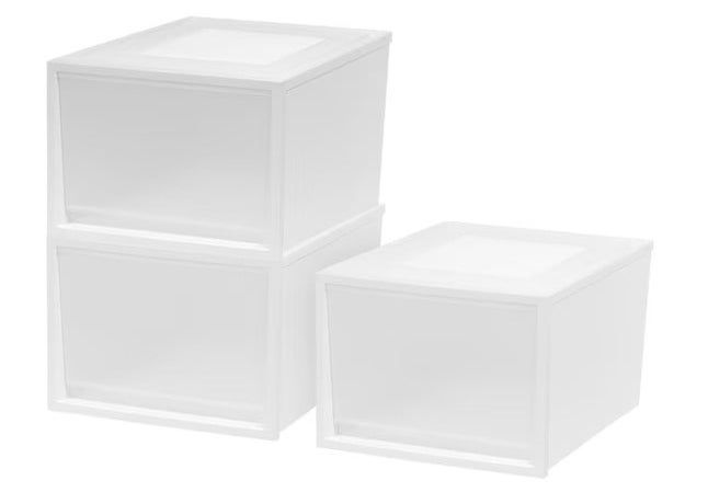 three white storage bins neatly stacked