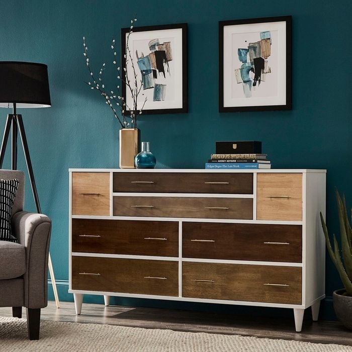 the dresser showcasing drawers in varying wood tones