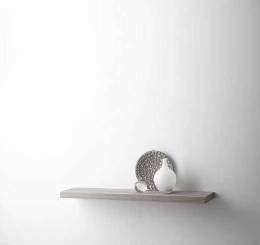 a gray floating shelf