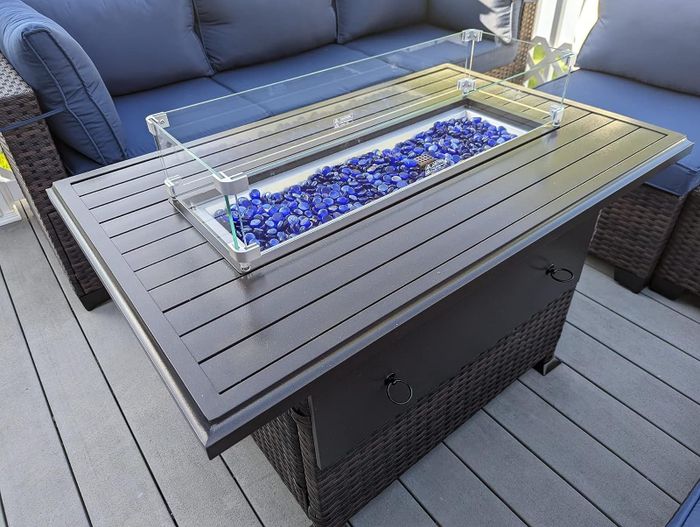 Reviewer's fire pit and patio set in blue.
