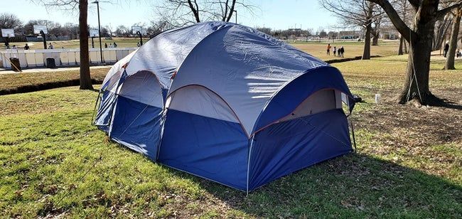 A reviewer's photo showcasing the long blue tent.