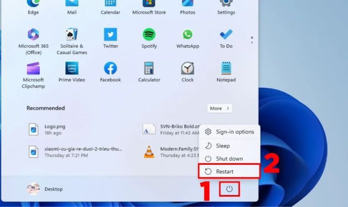 Chọn biểu tượng nguồn và nhấn vào Restart