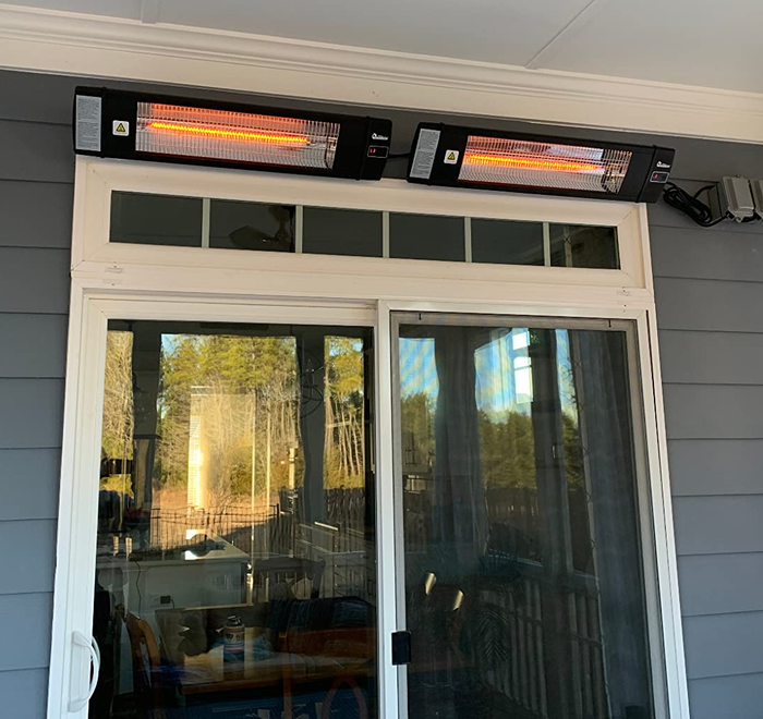 Two heaters installed above the doors of an outdoor deck.