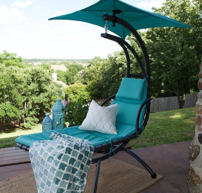 The blue swing set up in another reviewer's yard.