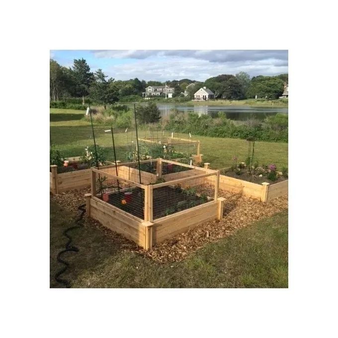 A reviewer's image showing fencing around their garden beds