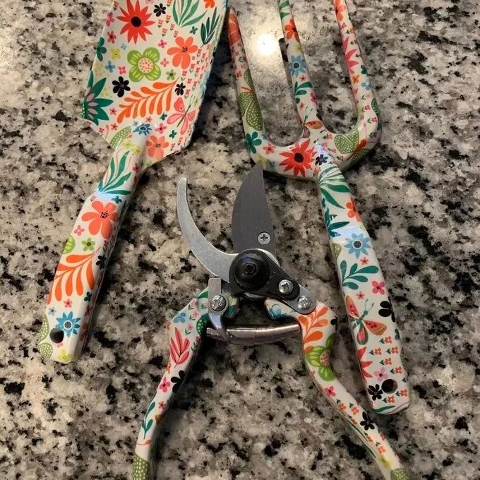 Reviewer photo showcasing the floral print gardening tools