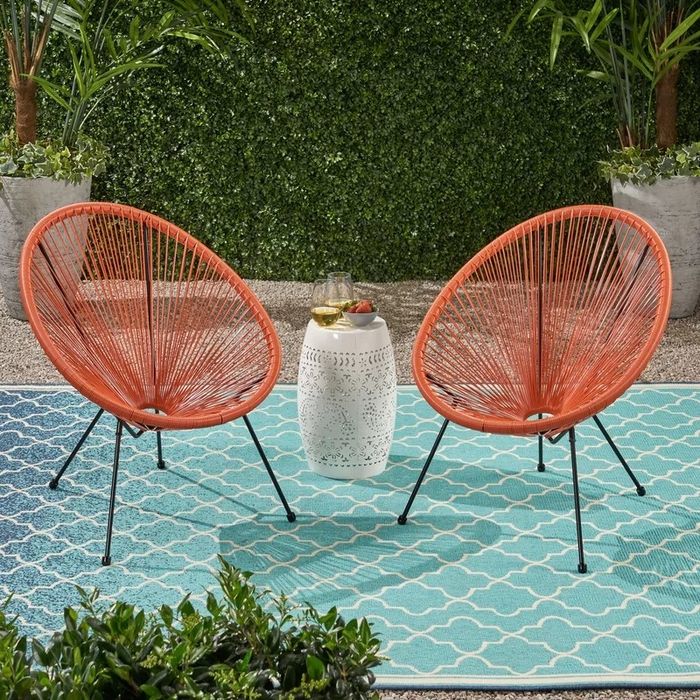 Two hammock weave chairs in vibrant orange.