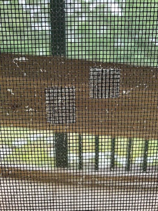 Reviewer image showing the tape applied to a torn screen