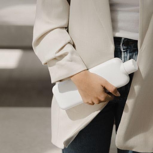 A model holding a rectangular, flat version of a white water bottle.