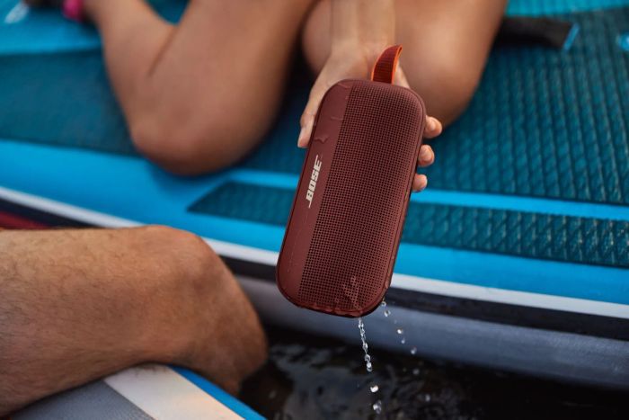 The Bluetooth speaker in a stylish burgundy shade.
