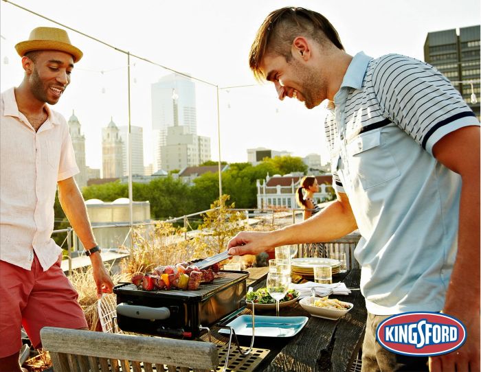 Someone grilling on the BBQ.