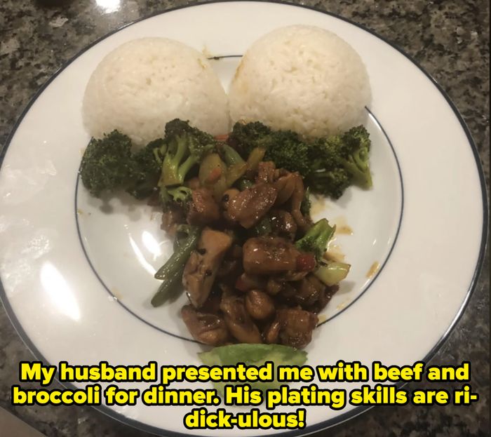 A plate with two mounds of rice, broccoli, diced chicken stir-fry, and a slice of avocado arranged to form a face