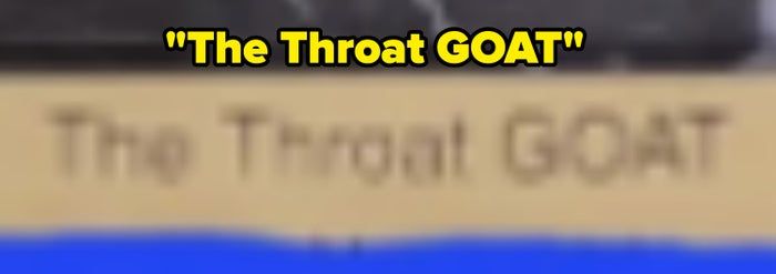 A sign displays the words: 'The Throat GOAT.'