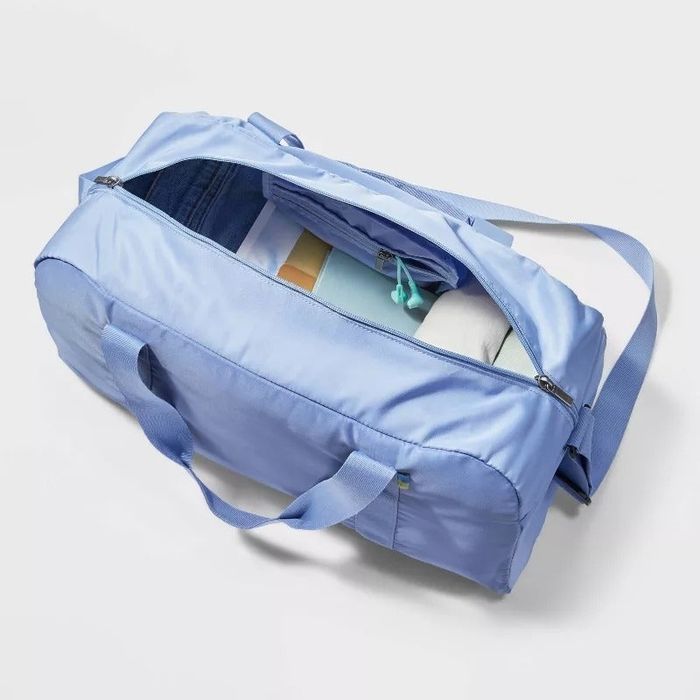 The duffel bag open, revealing its contents