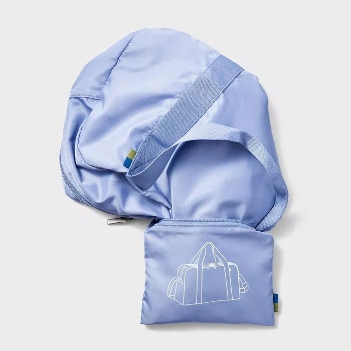 The packable pouch neatly folded and secured