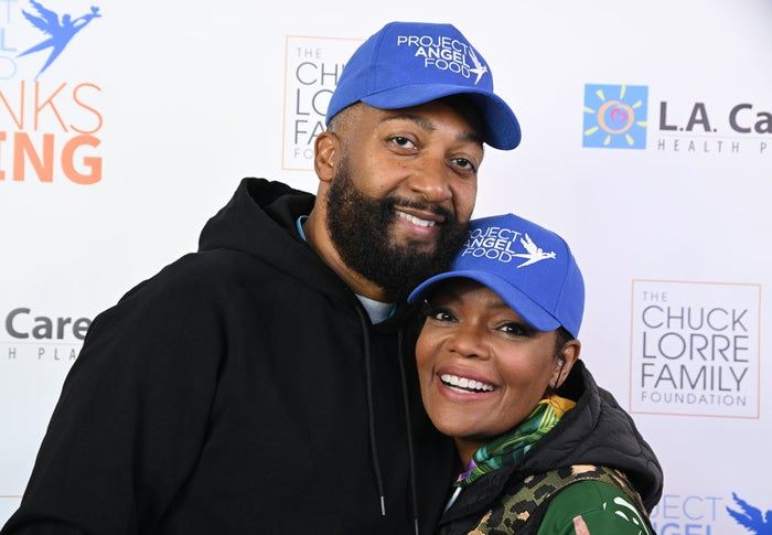 Two individuals wearing blue 