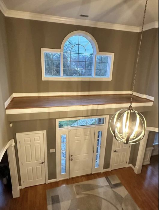 Aerial shot of an inaccessible foyer landing above the front entrance