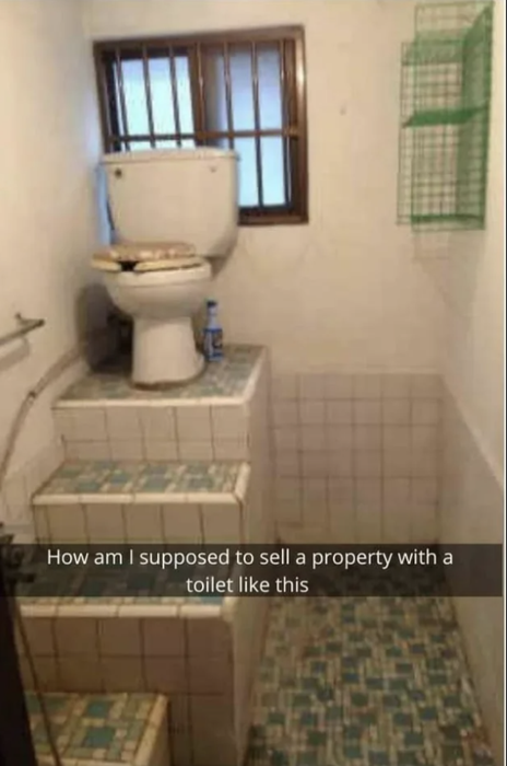 A toilet raised on a tiled platform within a bathroom, paired with a playful caption about selling the property