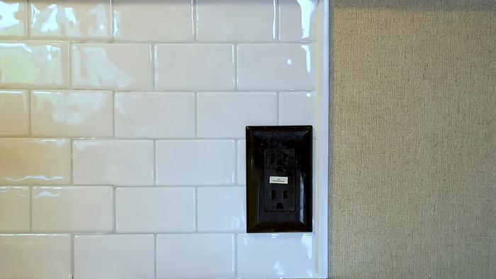 peel-and-stick tile on kitchen wall