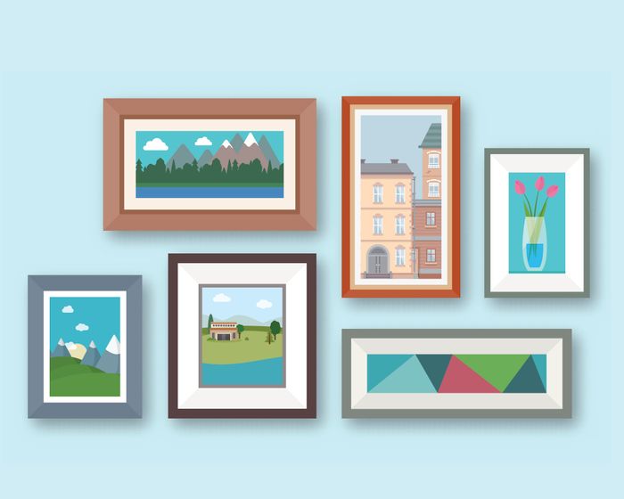 Framed pictures displayed on a wall.